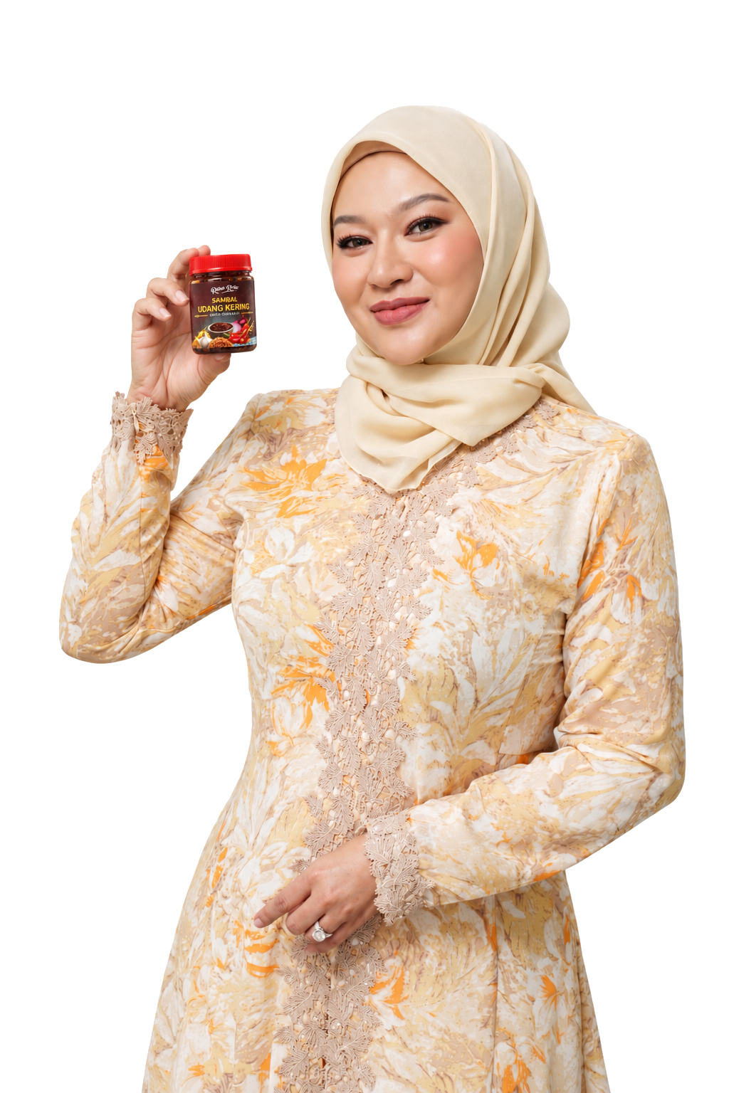 Dato’ Sri Rozita Ramelan holding a jar of Sambal Udang Kering